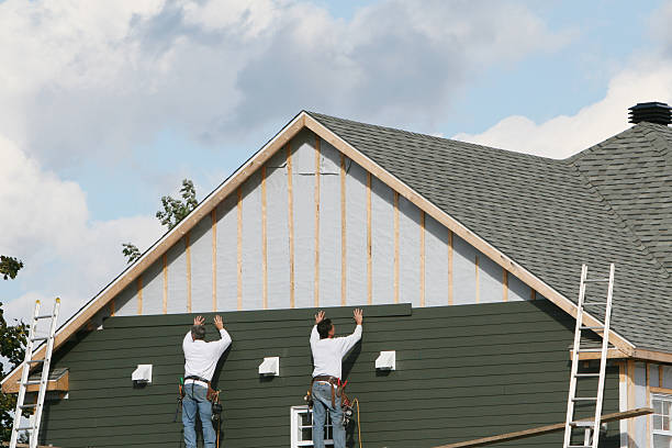 Professional Siding Installation technician working in Greenville, SC